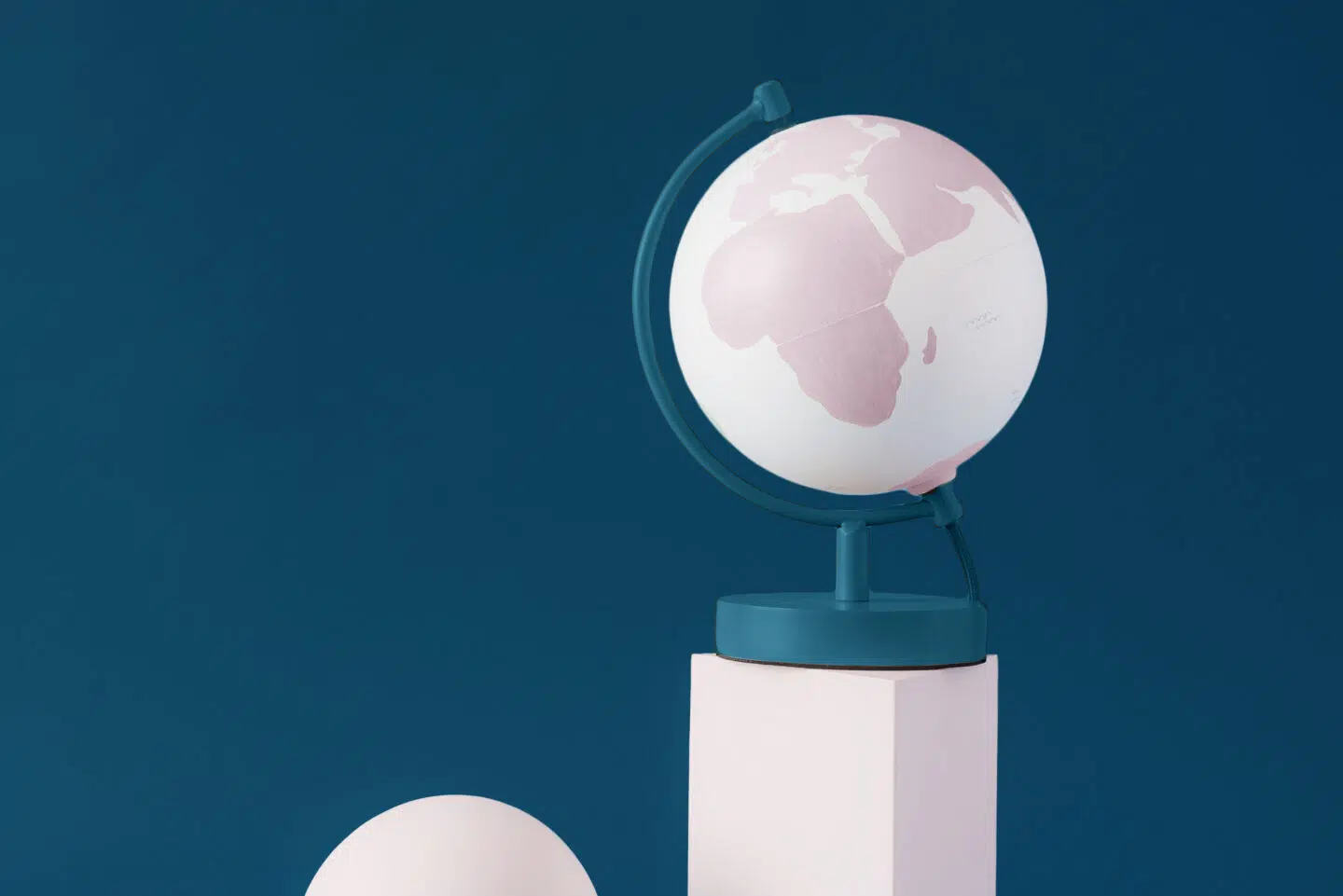 pink and green globe on a pink plinth in Oneflow colours