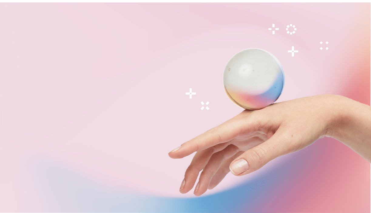 Hand balancing crystal ball on pink background - blog on 7 things you can do using Oneflow besides e-signature