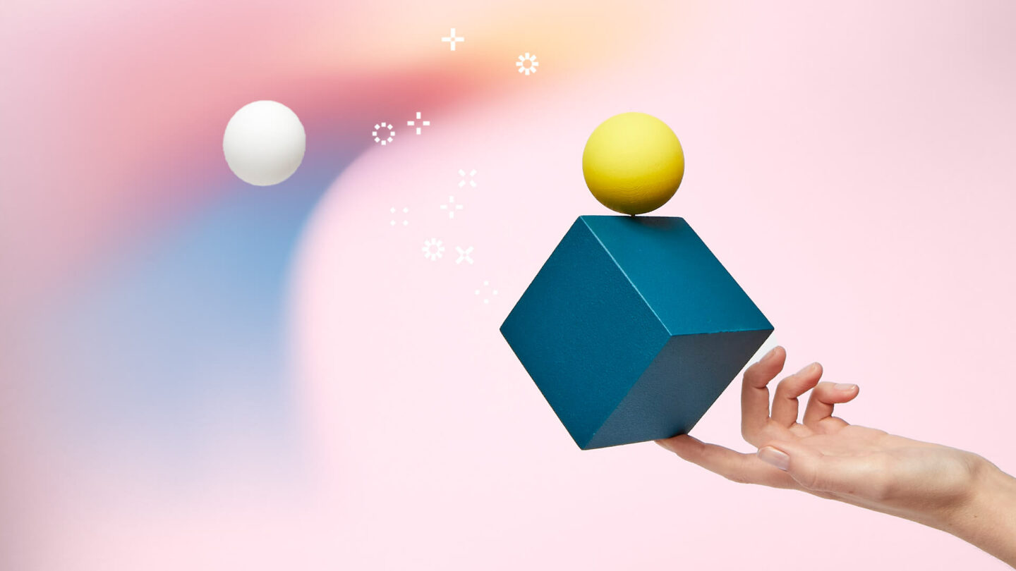 UX - dice balanced on cube, balanced on finger - Oneflow