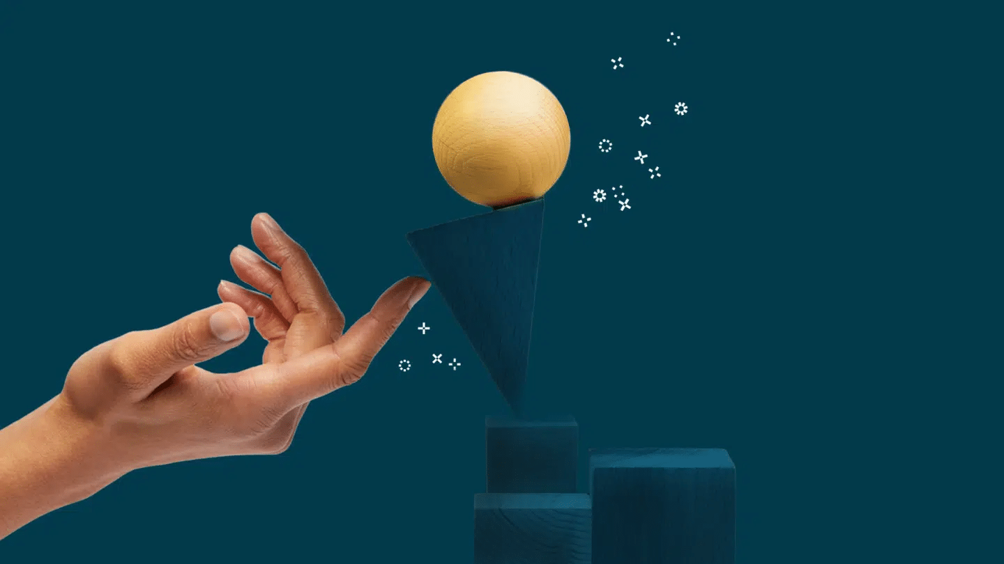 A hand with a ball and some geometric shapes showing how easy and effective contract management services can be